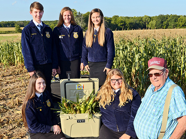 Nick Allen donates sweet corn for Troy, Missouri, FFA Chapter members to distribute to nursing homes and food pantries. From left: Lexi Collins, Emilee Harris, Jacob Love, Grace Rhodes and Kelsey Sachs , Image by Gregg Hillyer